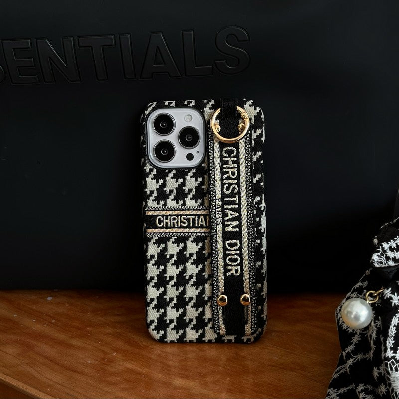 Modefodral för iPhone med Houndstooth-armband