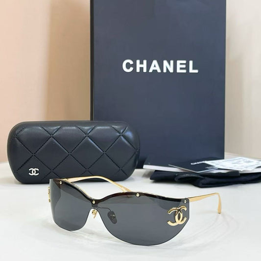 Gafas de sol de lujo con escudo sin montura | Gafas de moda UV400 con acento de metal dorado