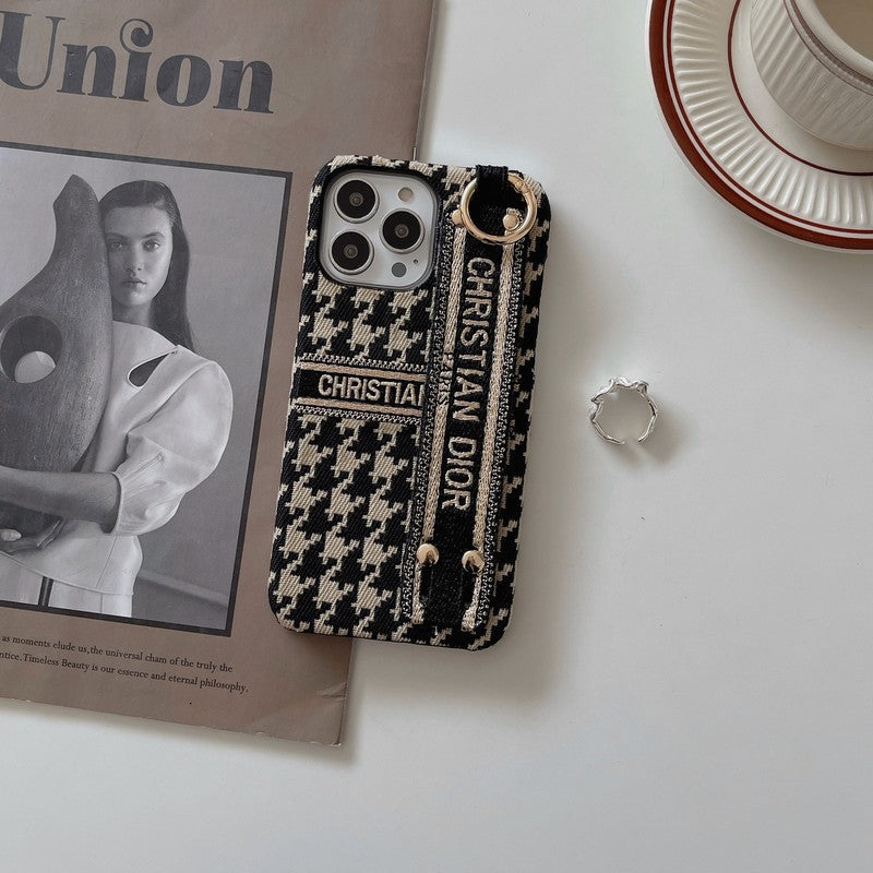 Modefodral för iPhone med Houndstooth-armband