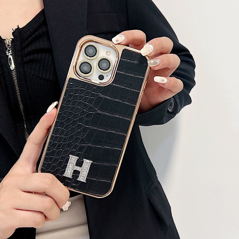 Klasyczne etui na iPhone'a z logo w kształcie diamentu w kolorze różowego złota