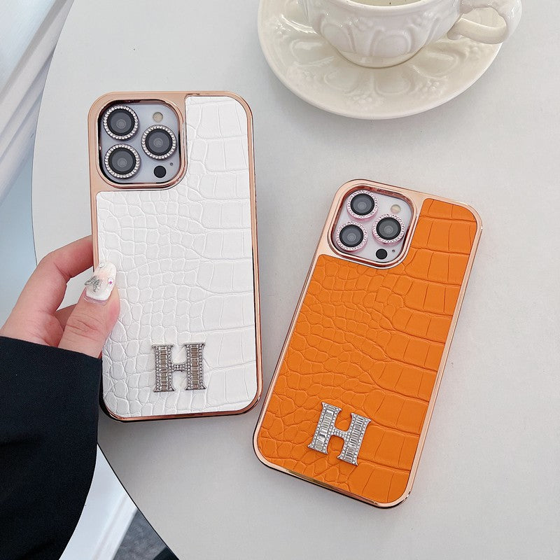 Klasyczne etui na iPhone'a z logo w kształcie diamentu w kolorze różowego złota