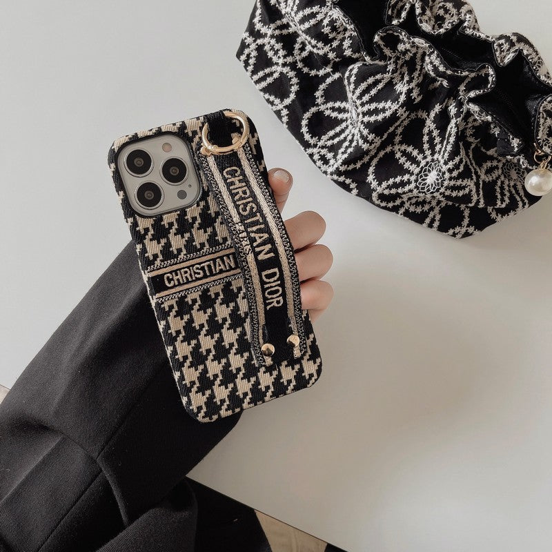 Modefodral för iPhone med Houndstooth-armband